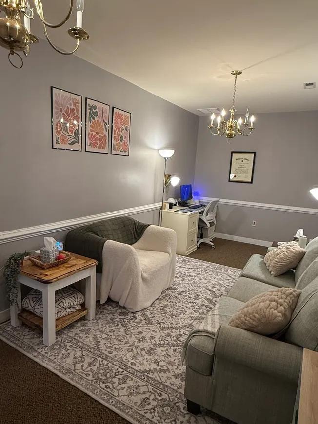 Office suite wide view with chandeliers